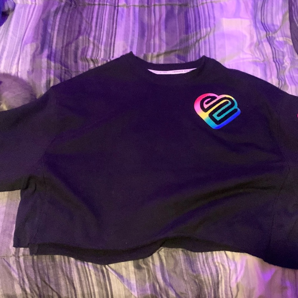 This is a cropped black hoodie